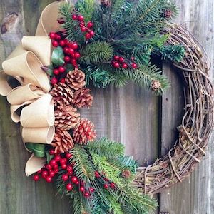 Rustic Grapevine Christmas Wreath with evergreen and berry sprays