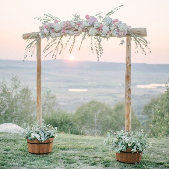 Bamboo-wedding-arch-with-pink-and-white-flowers-via-Andy-Barnhart ...