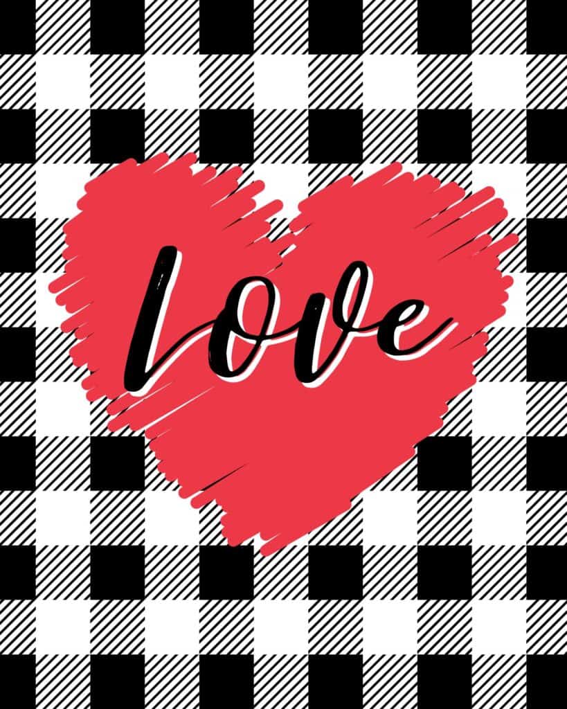 A red heart on a black and white buffalo plaid background and the word 'Love' in bold script.