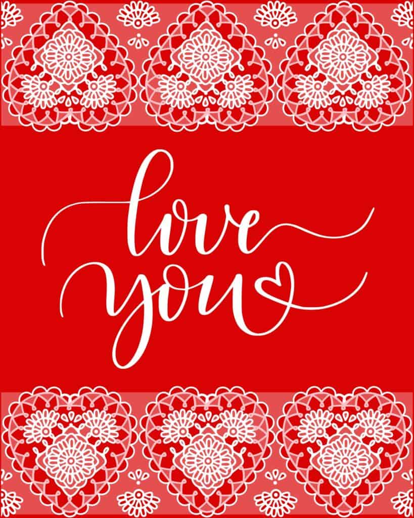 A romantic Valentine's Day printable featuring the script 'Love You' and intricate lace heart designs on a red background.