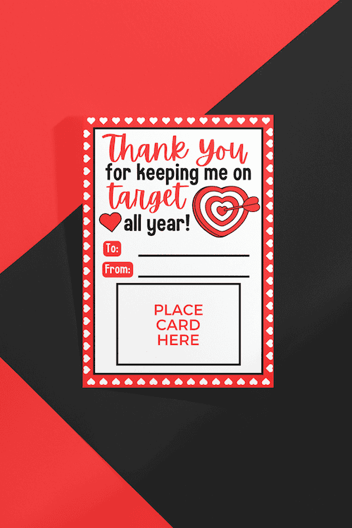 Red and white card holder with the message 'Thank you for keeping me on target all year!' featuring a heart-shaped target design and space to write recipient and gift details.